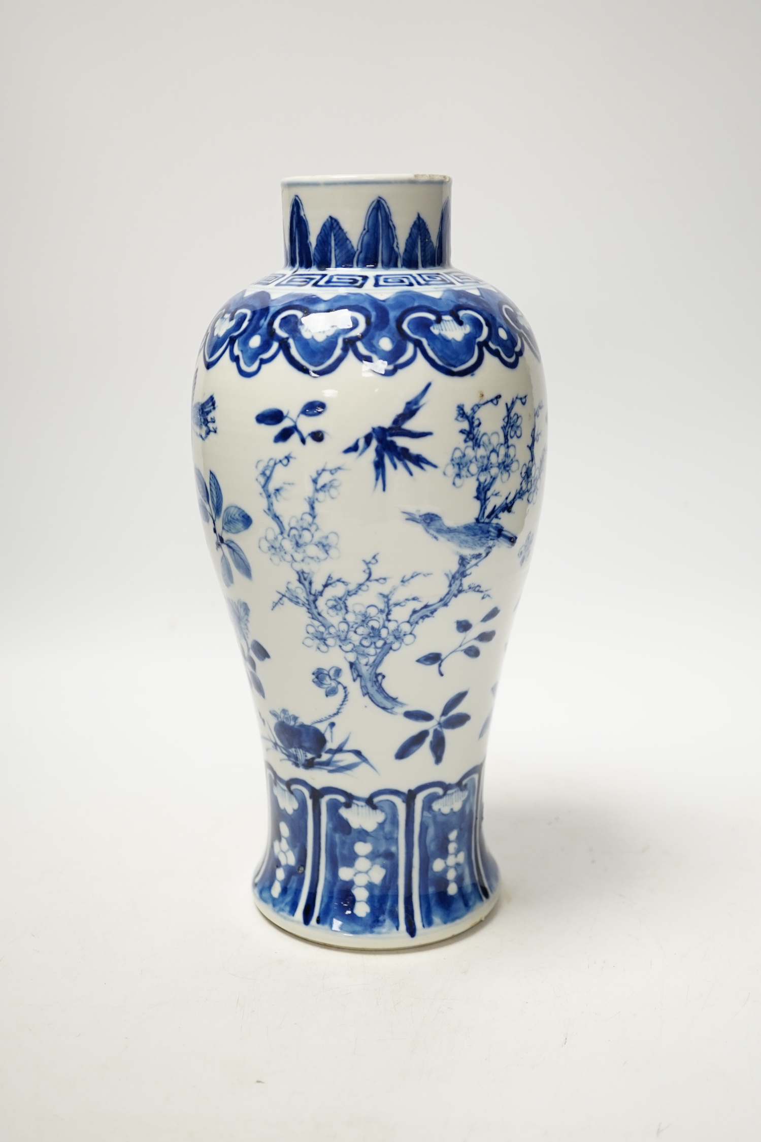 A Chinese blue and white baluster vase decorated with birds and flowers, late 19th century, 27cm high